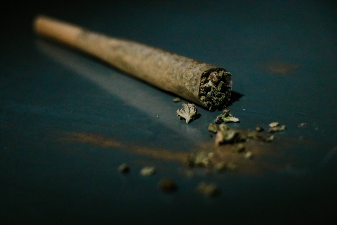 Menu brown-cigarette-stick-on-blue-surface-et2gcpyzze4